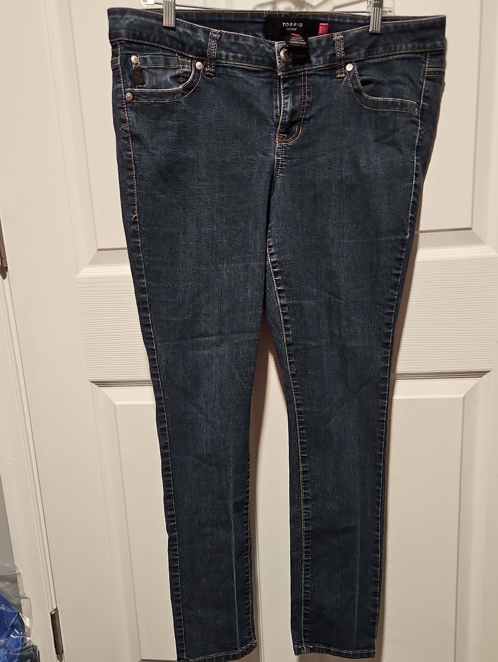 Early Torrid Low Rise Skinny Jeans in Dark Indigo Wash